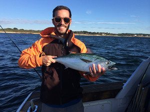 Eric Spicer '07 spent a lunch period with students discussing his post-Academy trajectory in the outdoor recreation industry.  Photo property of Oliver Hazard Perry Education at Sea.